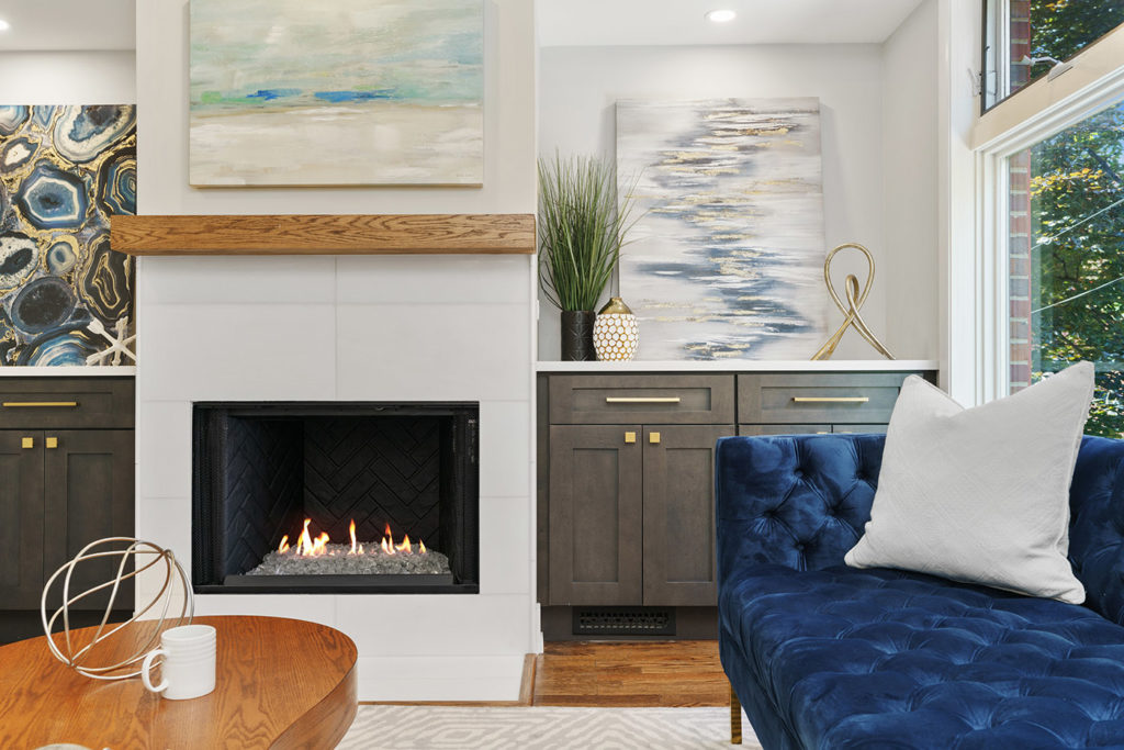 Photo of a living room fireplace and couch