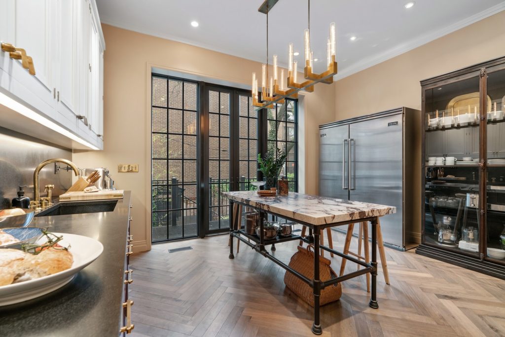 Kitchen with work bench and windows