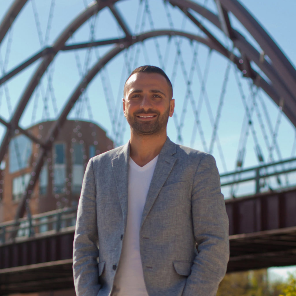 Headshot of John Dasdelen of MG Group Chicago